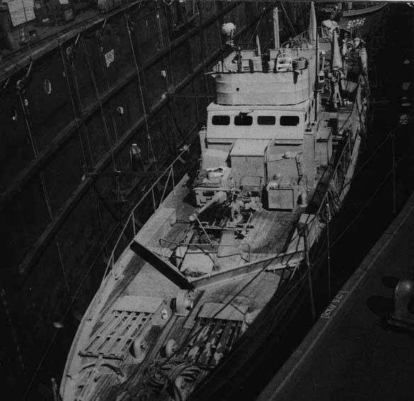 SC 648. Those big floating drydocks could hold three subchasers in column formation.